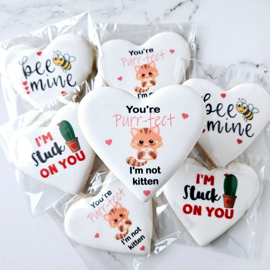 heart shaped logo cookies with valentine's day puns