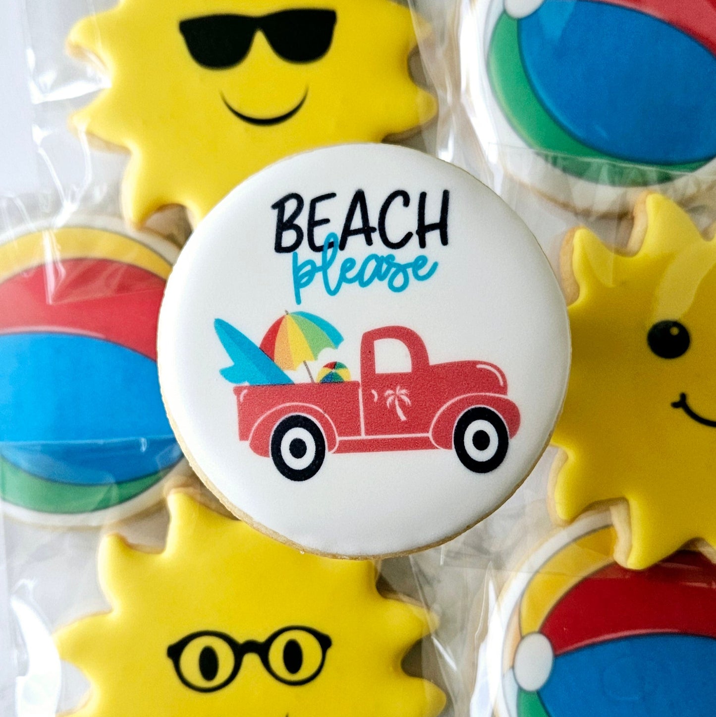 round logo cookie with beach please