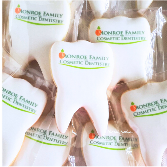 tooth shaped logo cookies with dentist logo