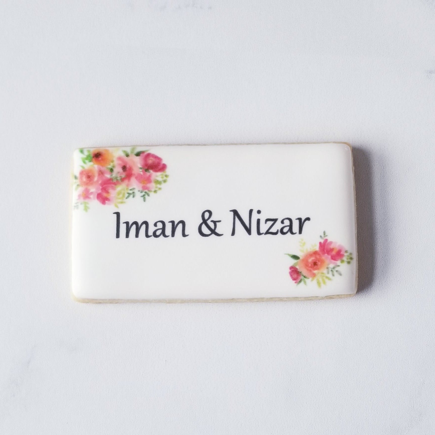 wedding favors, edible place cards, unique wedding ideas, edible image cookies, floral wedding cookies, floral rectangle name cookies, name cookies, printed cookies, bride and groom cookies